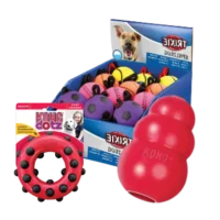 Juguetes perro Pelotas, mordedores y juguetes interactivos para perros, con ejemplos de juguetes de KONG y Trixie en diferentes colores y formas.